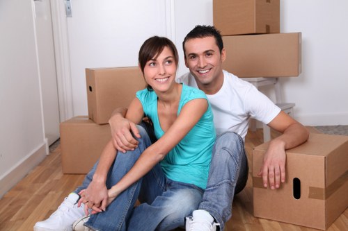 Professional movers handling a flat removal in Kenley